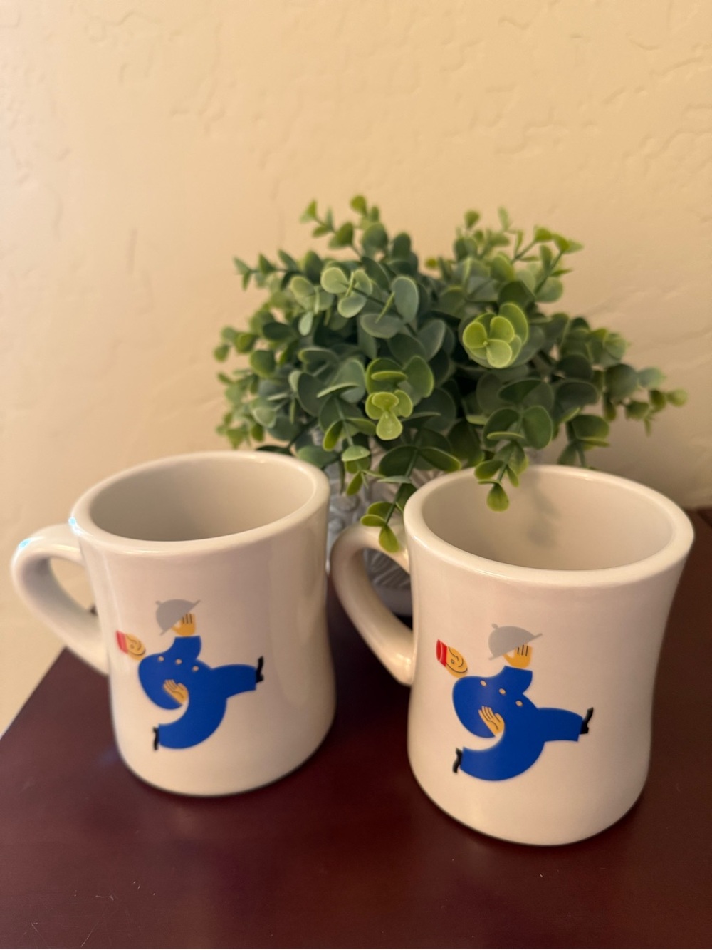 Restaurant Ware White Porcelain Mugs with Blue Running Waiter Graphic - Set of 2